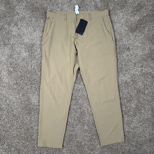 Fabletics The Only Pant Slim Pants Mens 35x32 Beige Stretch Water Resistant